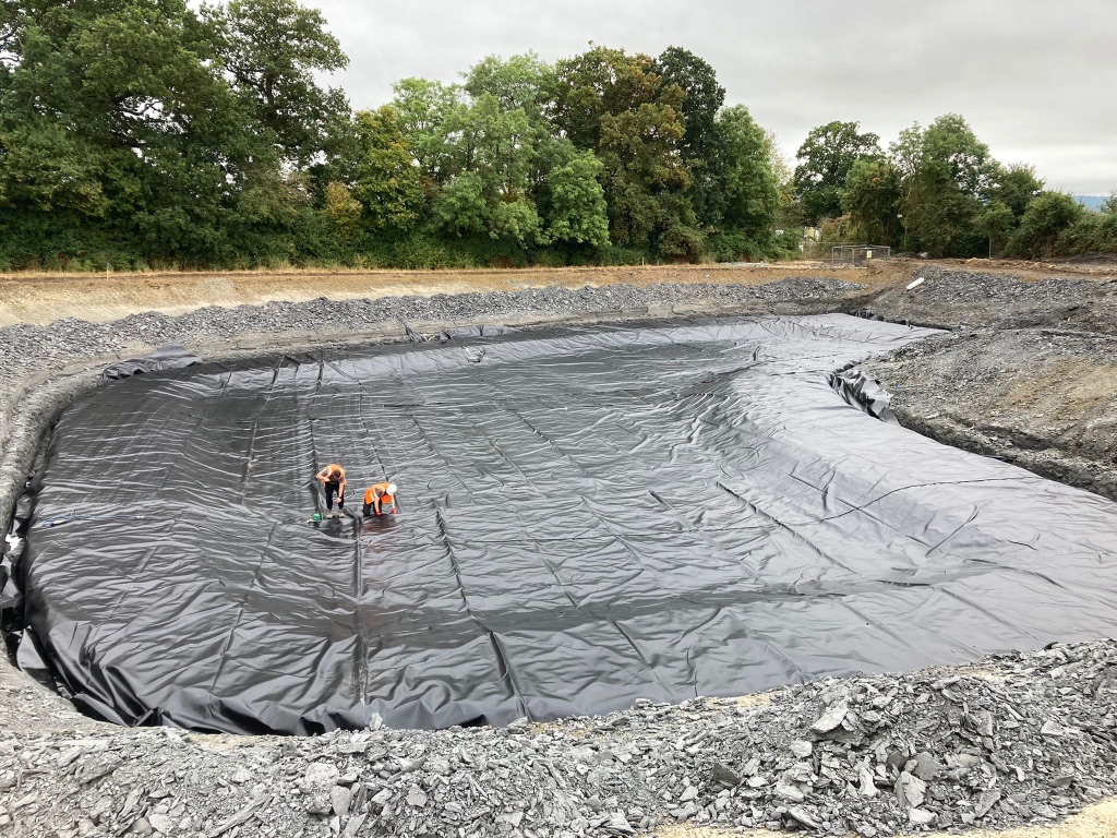 Lining of Attenuation Pond Completed