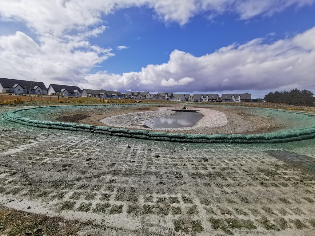 Hydroseeding in Scotland attenuation pond extension